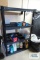 Black plastic adjustable shelving unit in basement