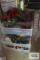 Plastic three drawer organizer with florals in basement