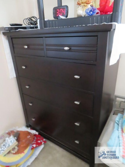 Cherry finish chest of drawers, on first floor
