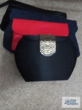 Black and red clutch bags