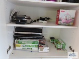 Cuisinart waffle maker, rapid egg cooker, candle warmer and vacuum sealer with bags
