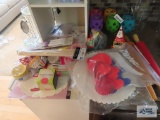 Variety of items, including rolling pins, cookie cutters, thermometer, cupcake liner