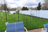 Shepherd's hooks and metal decorative fence pieces