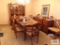 Fruitwood dining room set including table, six chairs, two leaves, server, and breakfront
