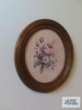 Roses print in oval frame