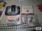 Oriental ashtray, Santa Fe Drilling Company Zippo lighter, cigarette box, andprinted cards