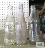 Antique squeeze bottle, preferred stock ketchup bottle and Anchor Brand bottle made by Coca-Cola