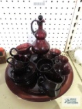 Purple cruet,has chip. small pitcher, serving plate, cups and saucers, and small glasses