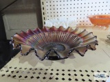 Purplish brown carnival glass fringed edge dish