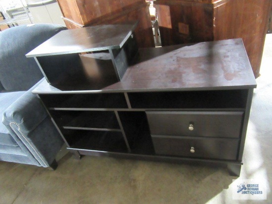 Entertainment stand. leg needs repaired.
