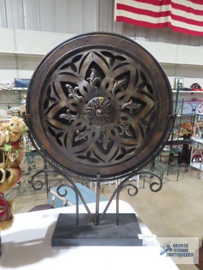Metal decoration on stand