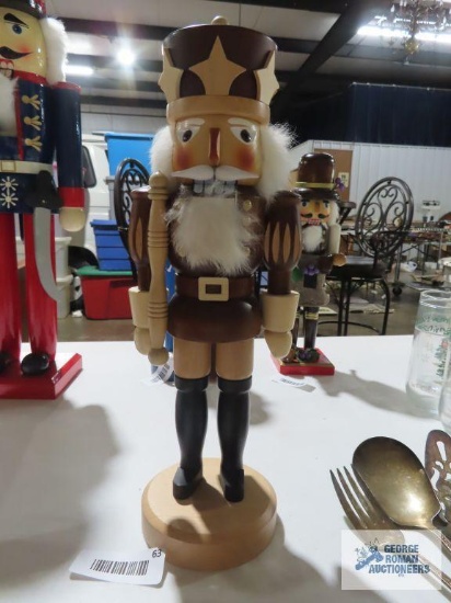 Wooden nutcracker, approximately 15 inches tall.