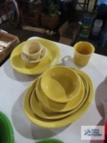 Assorted Fiesta dishware, yellow