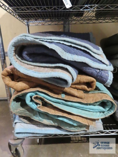 Eight assorted furniture moving blankets