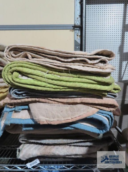 Ten assorted furniture moving blankets