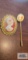 Pink and ivory cameo pins