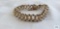 Gold colored bracelet marked 1/20 12K GF