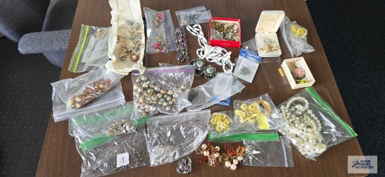 Variety of broken jewelry pieces