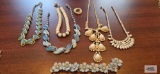Blue and white costume jewelry necklaces and floral bracelet