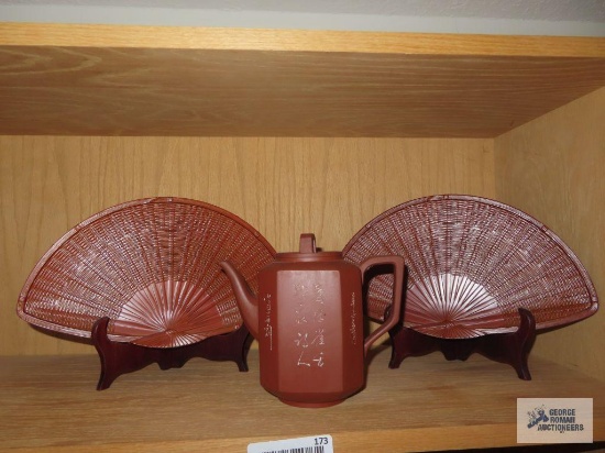Ceramic Oriental teapot and fan decorations