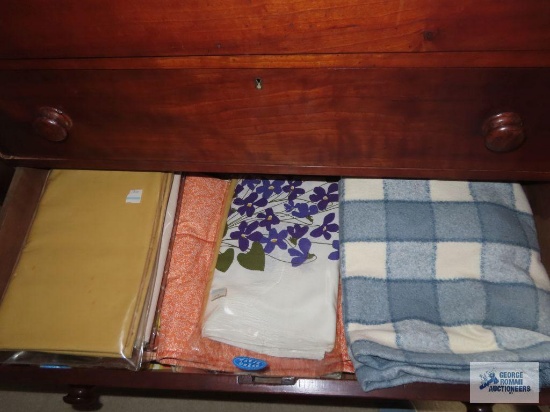 Variety of blankets, throws, and other linens