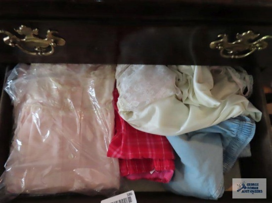 Variety of ladies nightgowns and belts
