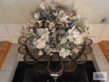 Fireplace folding screen and basket with floral arrangement