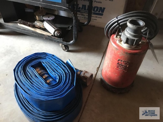 SUMP PUMP WITH 2" ROLL OUT DISCHARGE HOSE