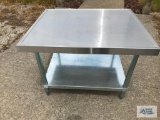 STAINLESS STEEL TABLE. 30