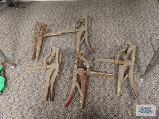 Five welding clamps