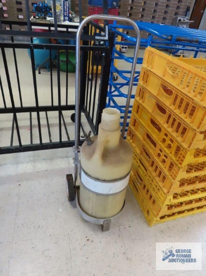 Fuel jug with cart