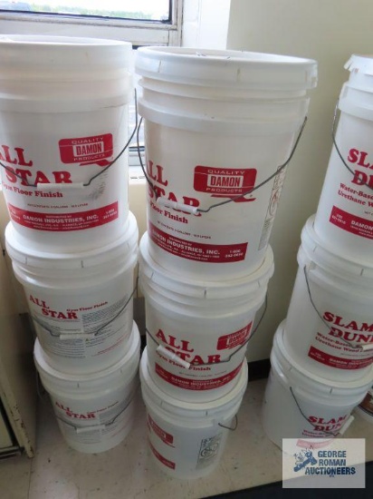 Three All Star 5 gallon gym floor finish. Not all of them are full