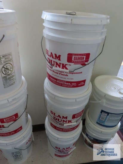 Two full and one partial 5 gallon buckets of All Star gym floor finish.