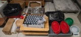 Large commercial kitchen item lot including salt and pepper shakers, plastic baskets, glass