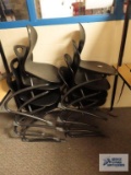 Eight school chairs