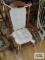Wooden rocking chair with cushions