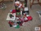 Variety of Christmas items, including ornaments, ties, figurines