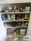 Paints, soldering gun, quick spare tire inflator and sealer, oils and etc in cabinet