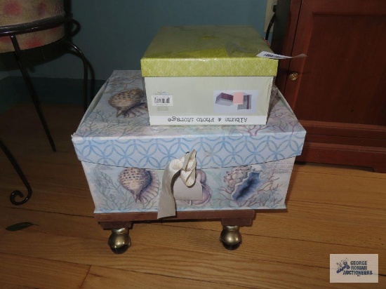 Sewing items, album and photo storage.