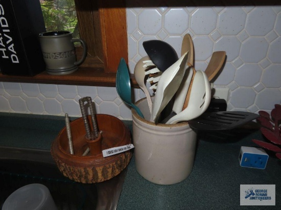 Crock with utensils and nut cracker with bowl