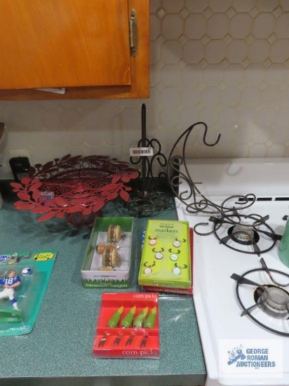 Metal paper towel holder, banana holder, cake plate, wine markers, tablecloth weights, corn holders