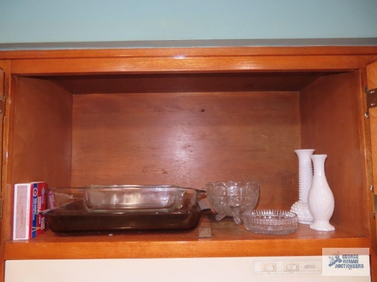 Glass baking dishes, serving bowls and milk glass vases.