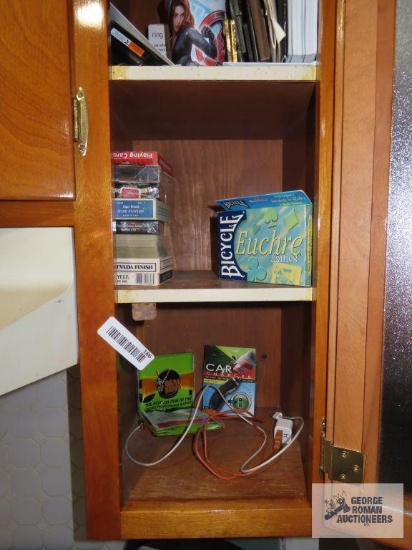 Variety of playing cards, car charger, etc.