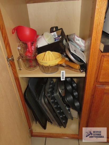 Baking pans, Pyrex measuring cups, Kitchenaid juicer, digital kitchen scale, etc.