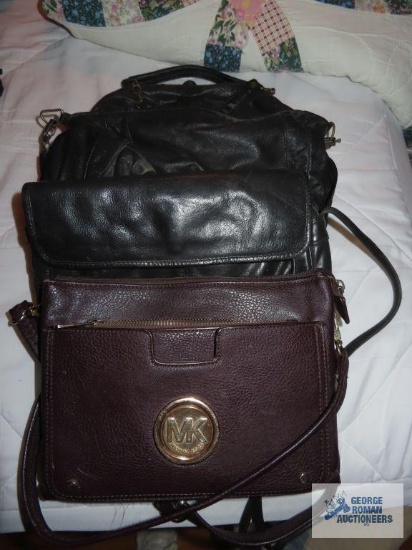 Variety of purses including Michael Kors, authenticity unknown