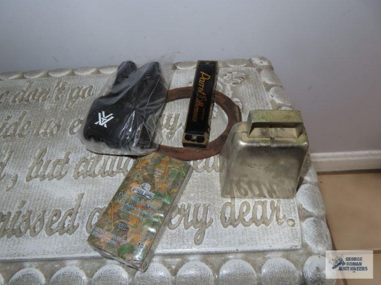 Parrot harmonica, cowbell, horseshoe, etc