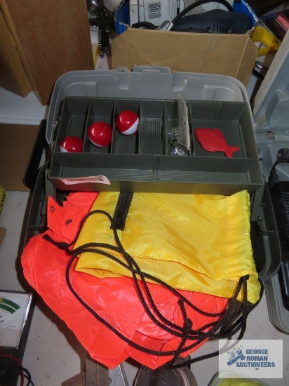 Tackle box with small amount of tackle, rain suit, and canvas bag