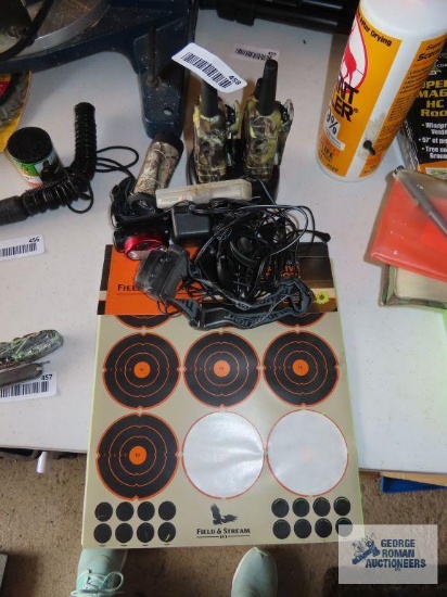 Midland walkie-talkies, flashlights, headlights, and reactive target spots.