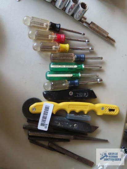 Nut drivers, screen tool, utility knives, and punches