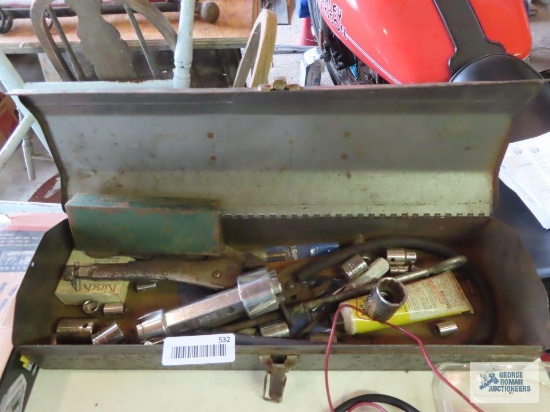 Metal toolbox with assorted tools including Proto sockets